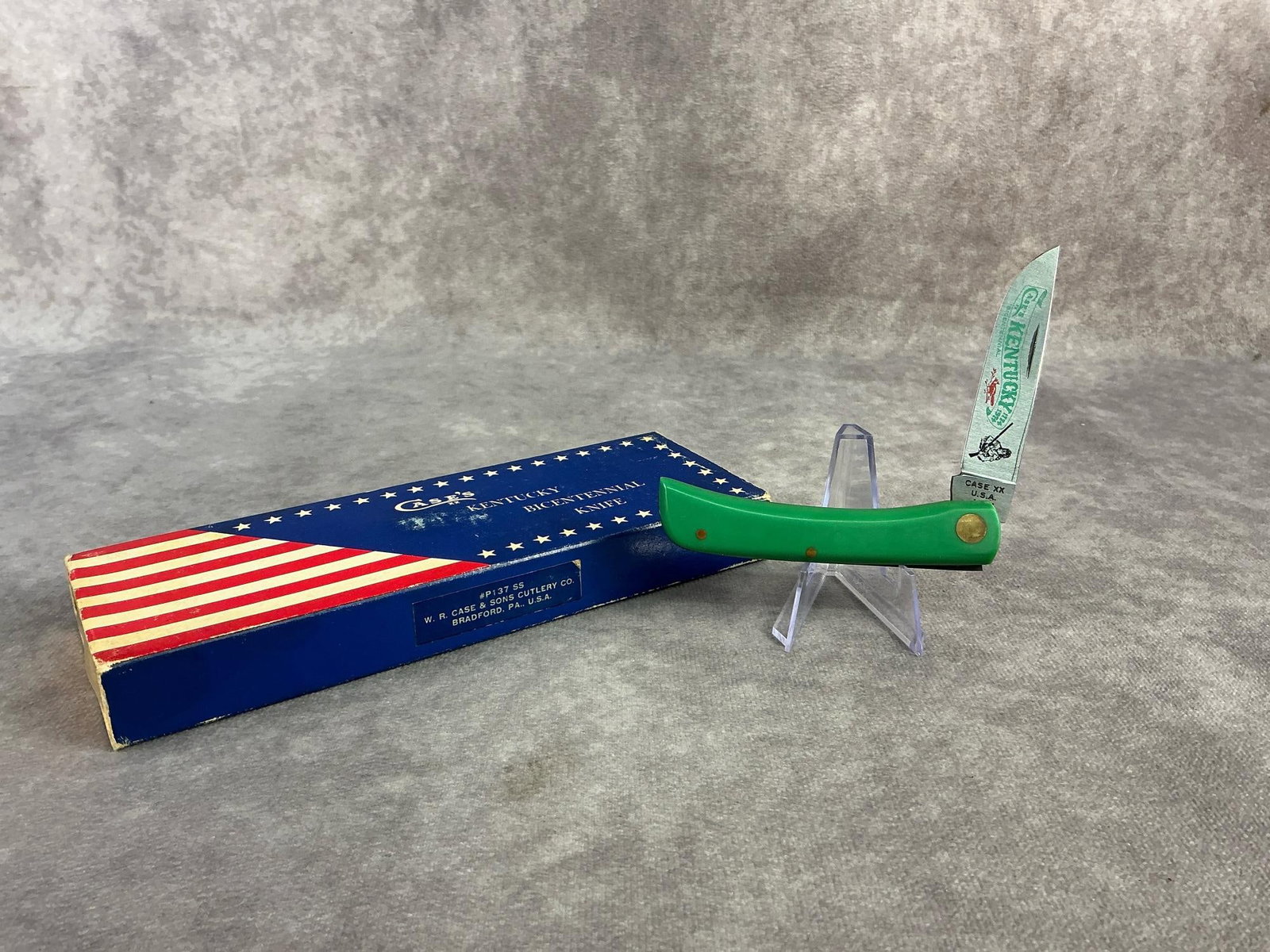 Case XX Knife: 1974 Case XX knife commemorating Kentucky Bicentennial. Sodbuster, patterned 5137, tight snap and comes in original display box. Box measures 7.5 inches x 2.5 inches tall.