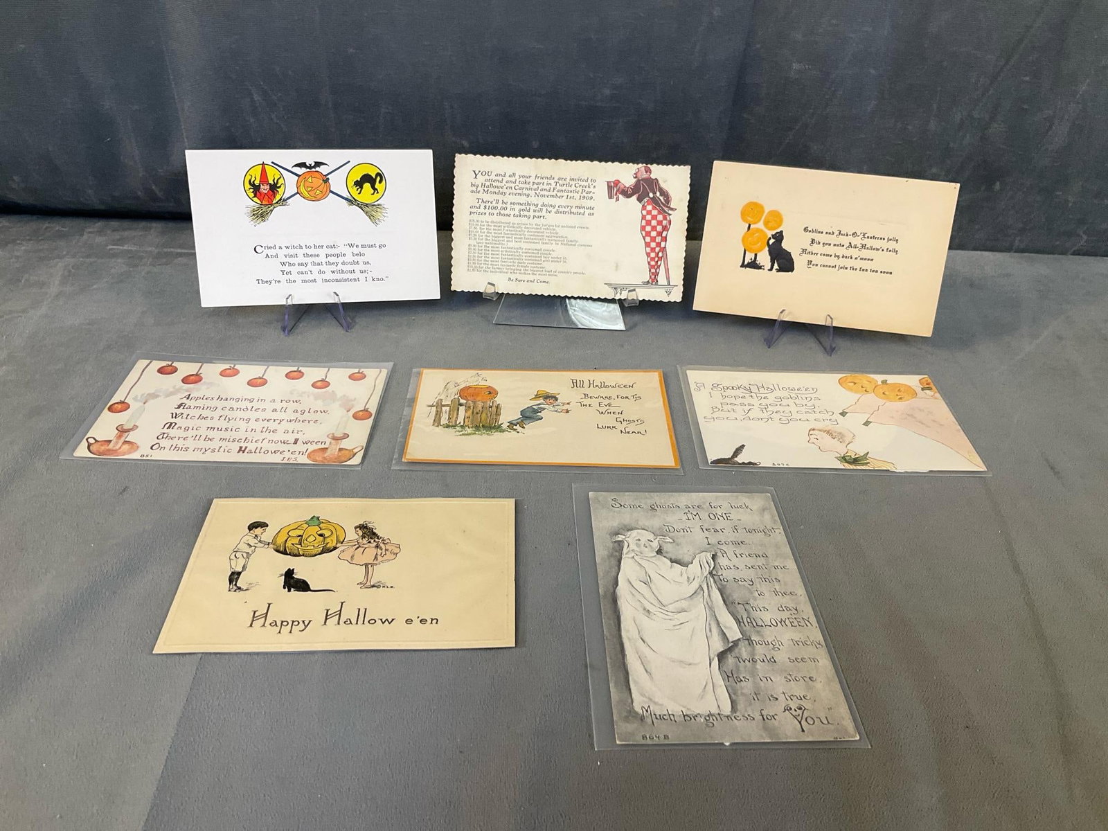 Halloween Postcards: Eight early 20th century Halloween postcards. Includes postcards by; Woehler, Leubrie & Elkus, F.A. Owen Company and Gibson and Rose. Good used condition. Measures 5.5 inches wide x 3.5 inches tall.