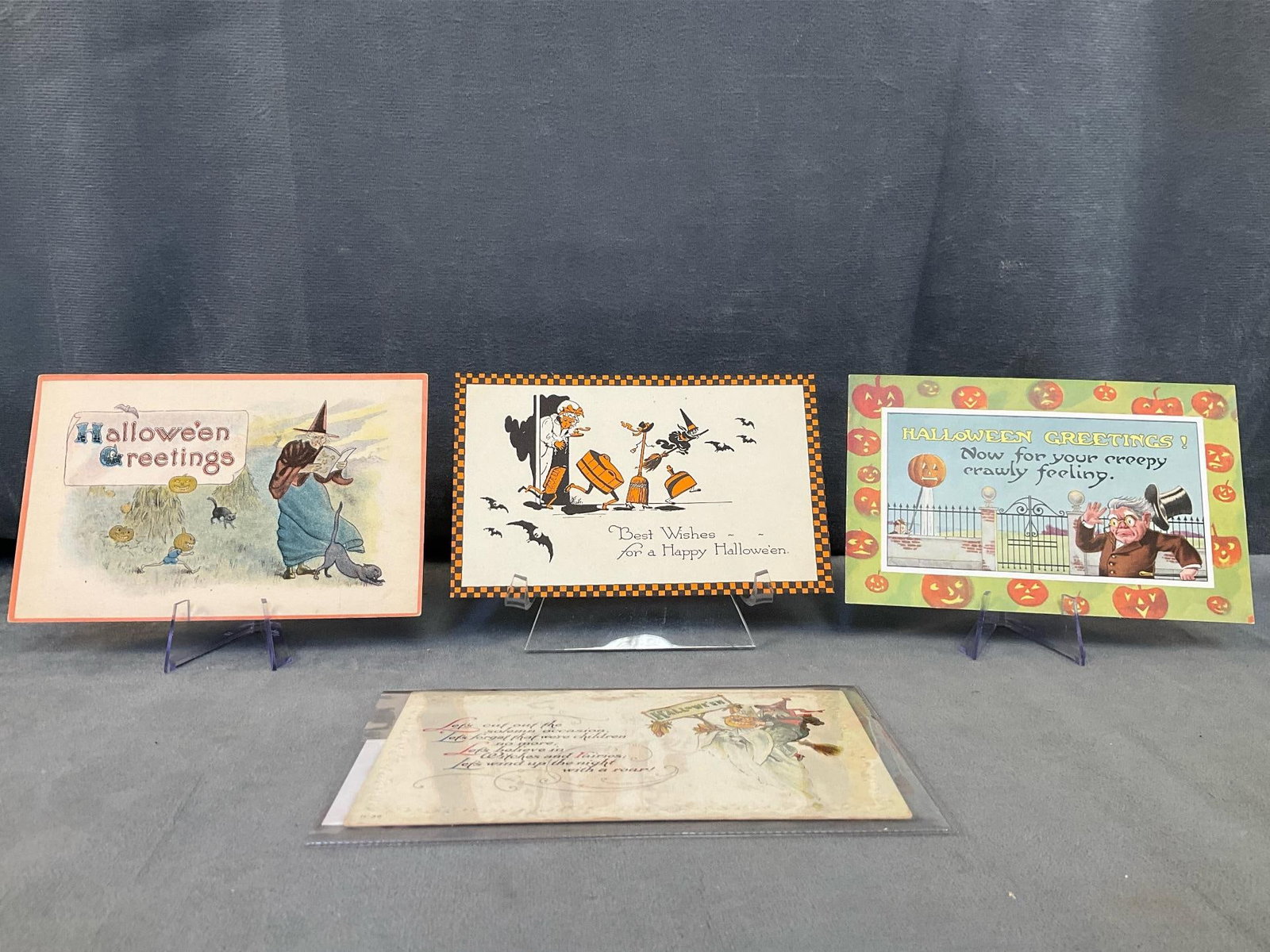 Halloween Postcards: Four early 20th century Halloween postcards including; One Barton & Spooner CS 600 "Hallowe'en Greetings" postcard and two Gibson postcards. Good used condition. Measures 5.5 inches wide x 3.5 inches