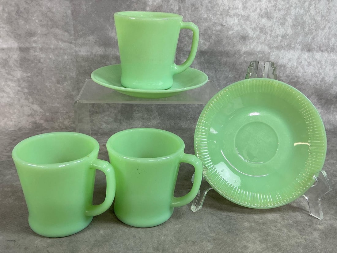 Fire King Jadeite: Five mid 1900's Anchor Hocking Jadeite cups and saucers. Jane Ray pattern with ribbed edges on saucers. One saucer has slight discoloration around edge, otherwise in good condition. Saucer measures