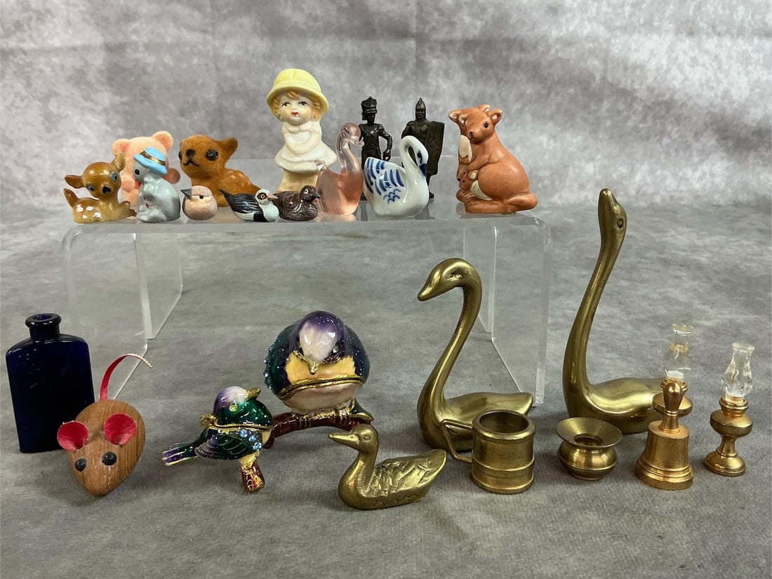 Miniatures, Trinket Bird Box, & More: Twenty-five late 1900's miniature collection. Includes brass swans, bird and baby jeweled trinket box, soldiers, deer, and more. In good condition. Tallest swan measures 1.75 inches wide x 3.5 inches