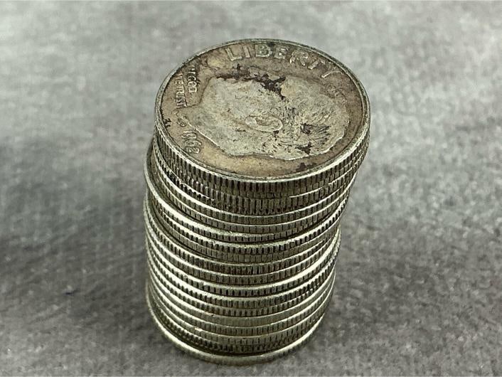 Silver Dimes: Twenty pre 1964 dimes. All in fair to good circulated condition. Total weight 1.59 ozt.