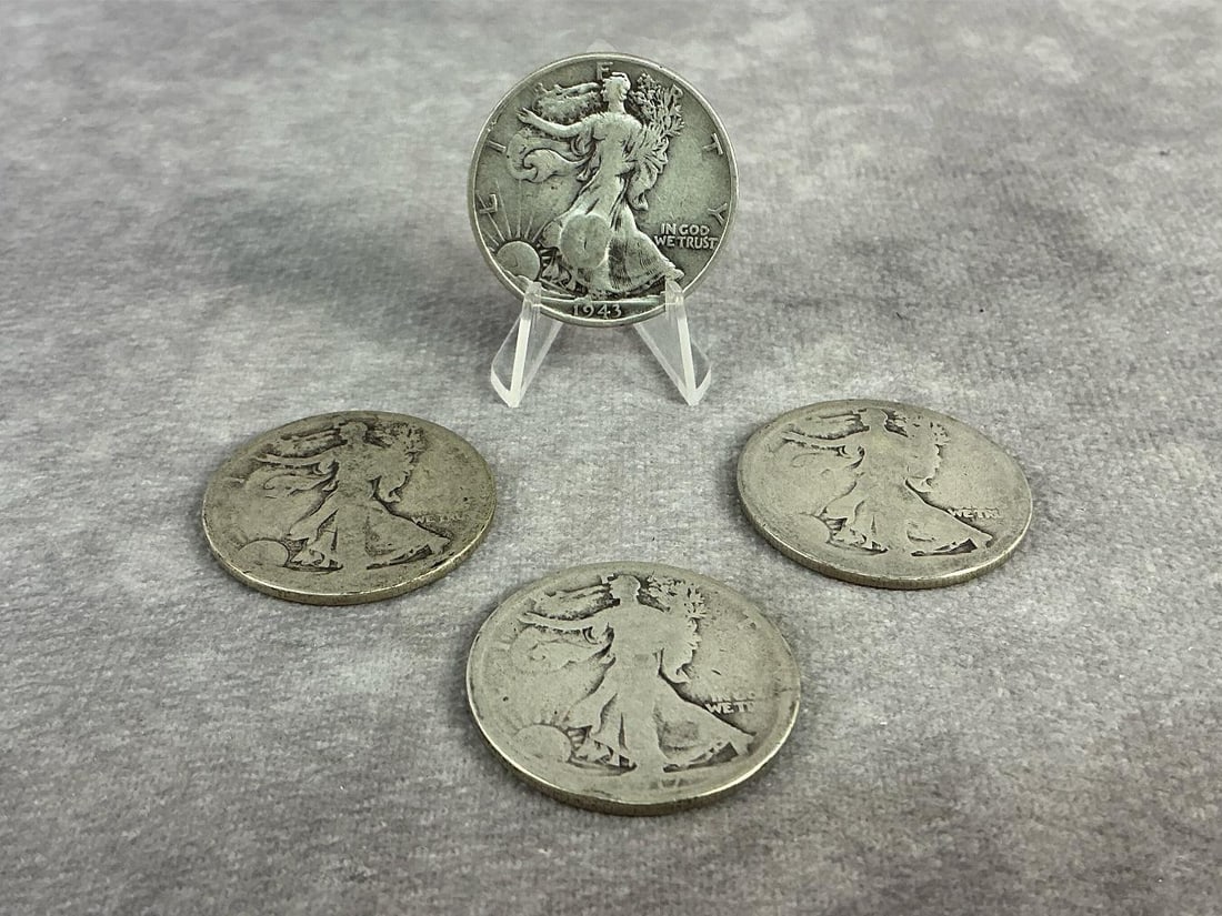 Walking Liberties: Four 1943 Walking Liberty Half Dollars. All in fair to good circulated condition. Total weight 1.5 ozt.