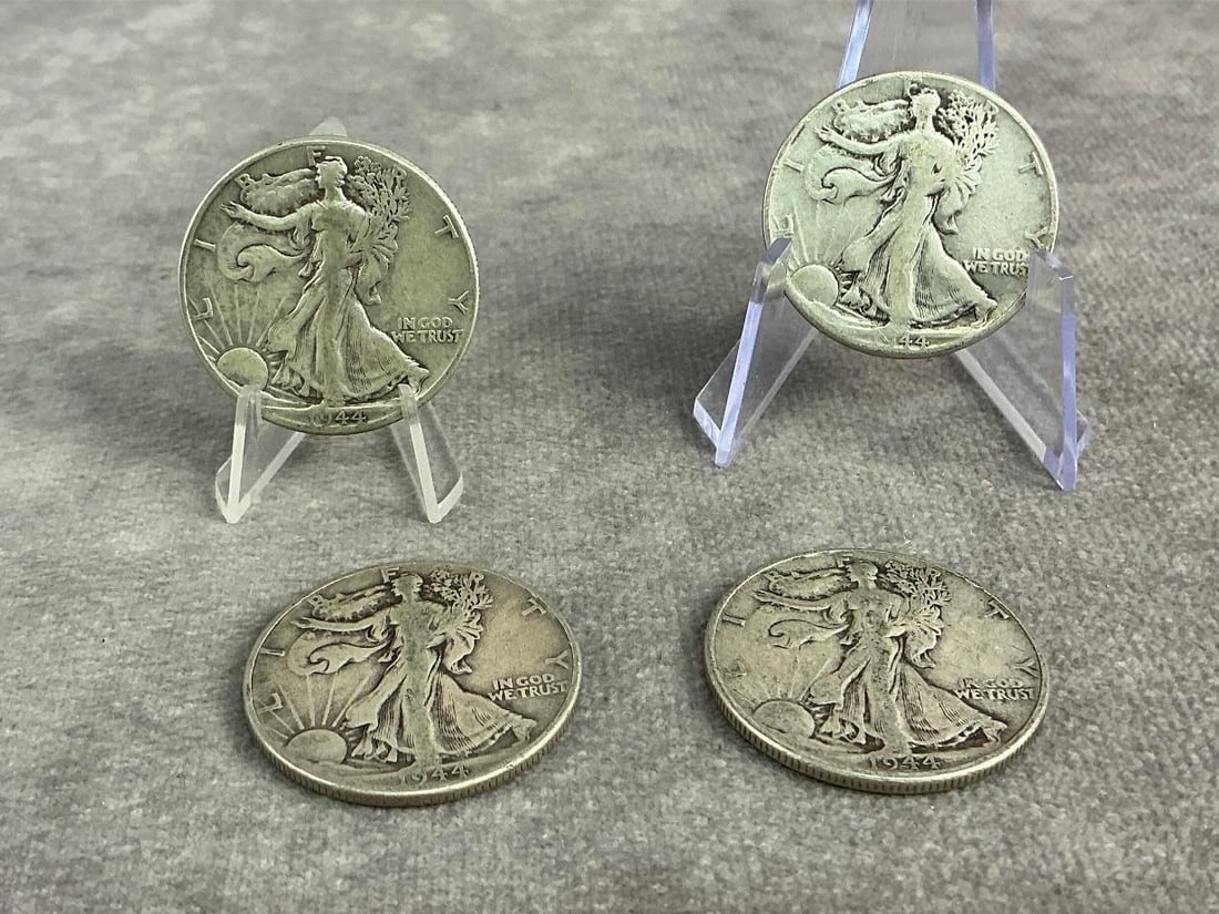 Walking Liberties: Four 1944 Walking Liberty Half Dollars. All in fair to good circulated condition. Total weight 1.57 ozt.