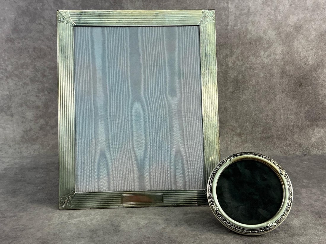 Sterling Frames: Two sterling silver picture frames. Both in good condition, stamped with oxidation present. Total weight 7.09 ozt.
