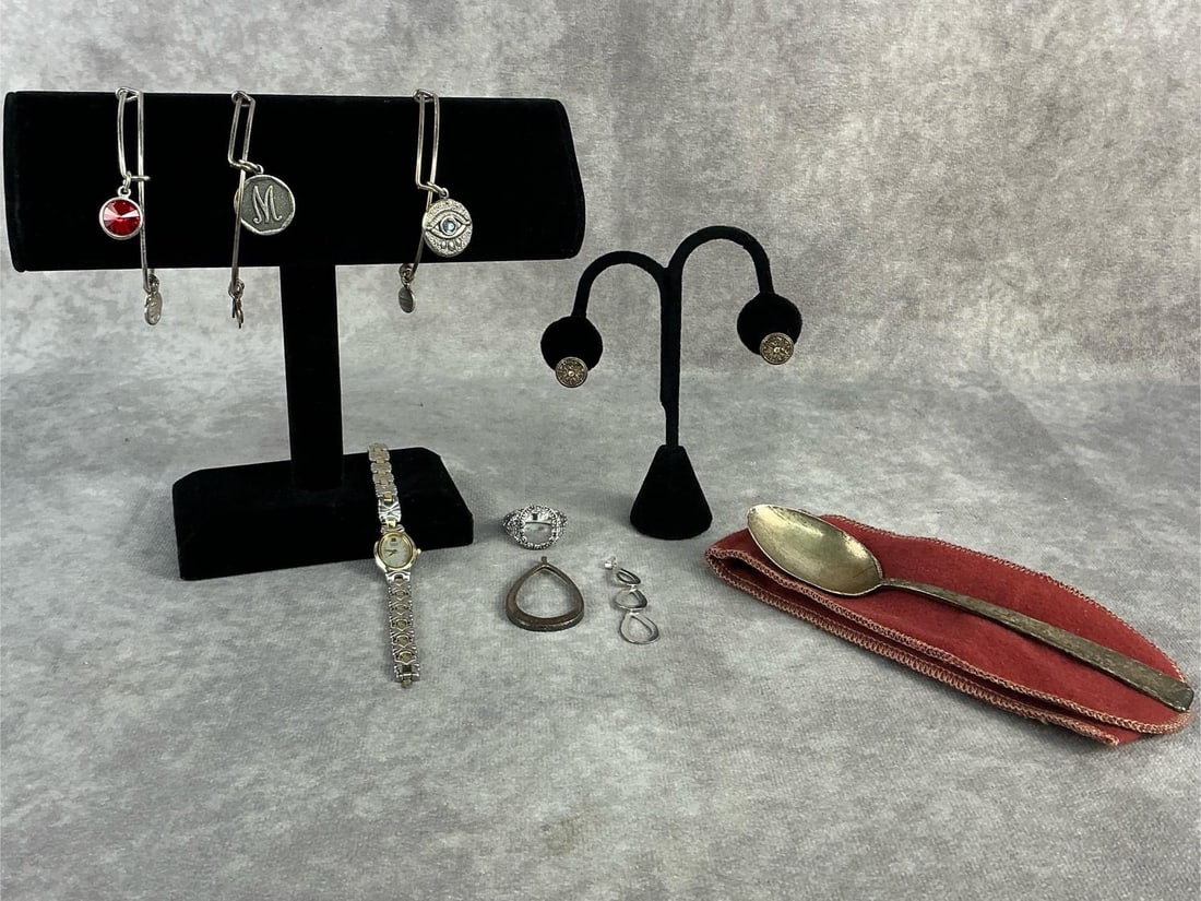 Sterling Spoon & Costume Jewelry: Antique sterling silver spoon featuring makers mark for Durgin, ladies Citizens two tone bangle watch, three Alex and Ani expandable bangles, and more. All in good condition with watch needing a