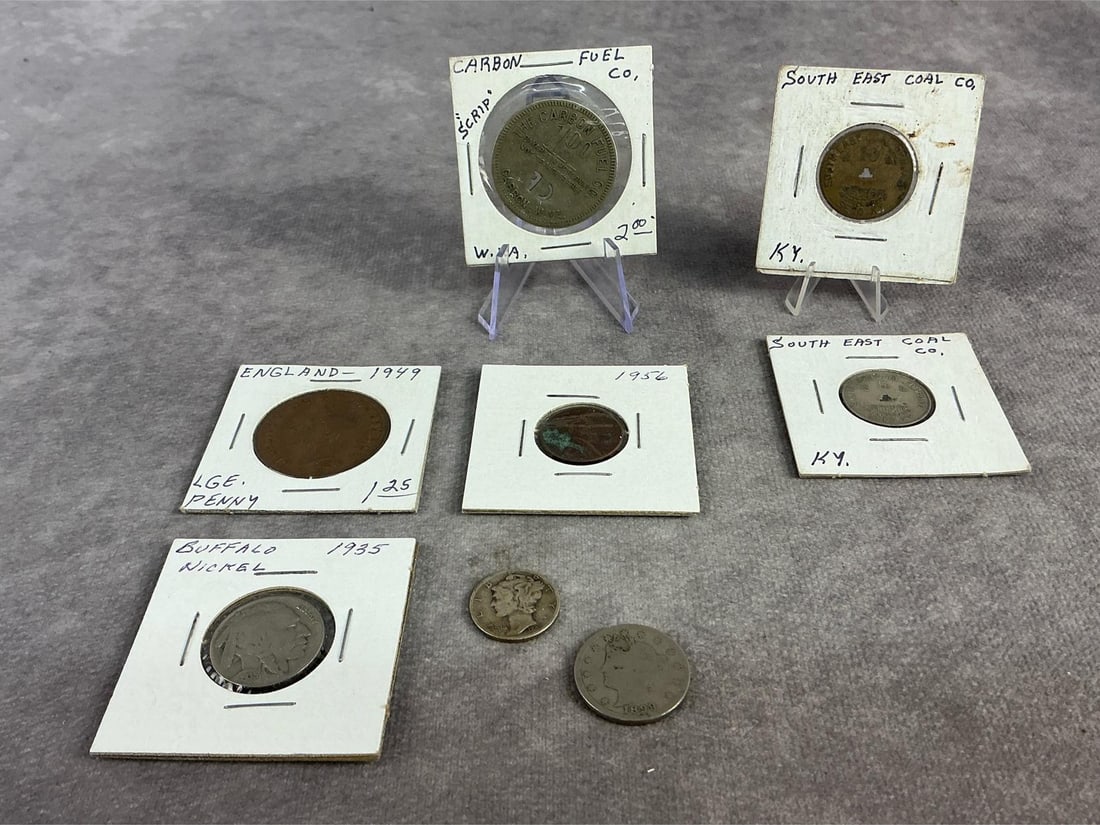 Mixed Coins: Three Coal tokens, one foreign large 1949 penny, and four United States coins. All in fair to good circulated condition. Largest coin measures 1.15 inches in diameter.