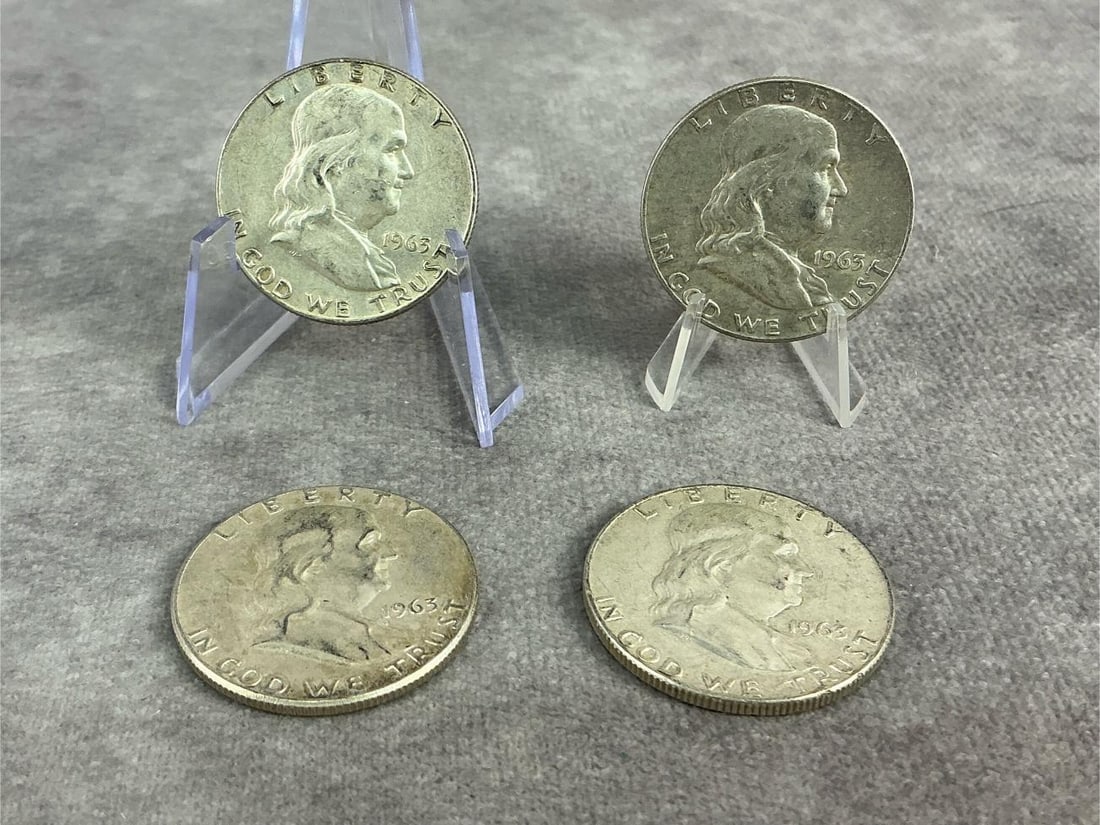 Franklin Halves: Four 1963 Franklin half dollars. All in good circulated condition. Total weight 1.6 ozt.