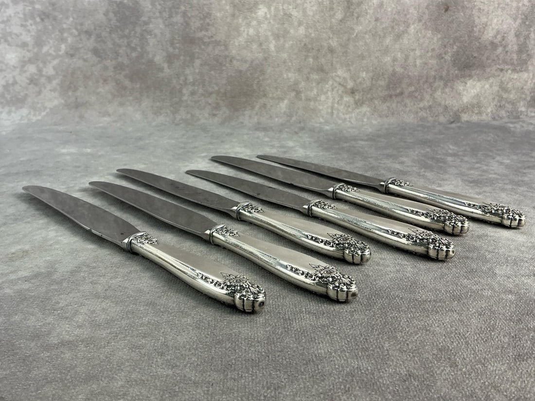 Sterling Butter Knives: Six sterling silver handled butter knives with stainless ends made by International and patterned in Prelude. All in good condition with oxidation present. Total weight 12.12 ozt.