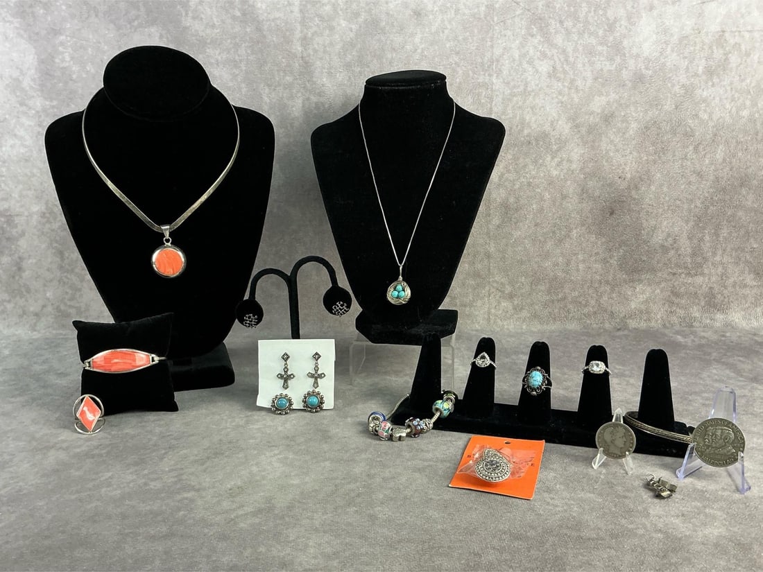 Sterling & Costume Jewelry: Sterling silver and costume jewelry including two necklaces, four earring pairs, four rings, three bracelets and more. All in good condition. Total weight on sterling is 0.47 ozt.