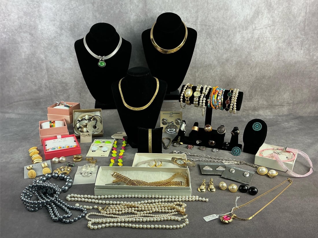 Costume Jewelry: Approximately 50 plus pieces of costume jewelry including necklaces, bracelets, earrings, brooches and more. All in good condition with brands such as Kim Rogers, Liz Claiborne, Monet, Avon, etc. Long