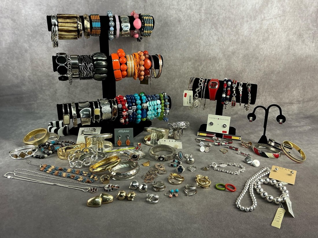 Bangle Delight & More: Approximately 50 plus pieces of costume jewelry including necklaces, bracelets, earrings, brooches and more. All in good condition with brands such as Tommy Hilfiger, Ralph Lauren, Guess, etc.