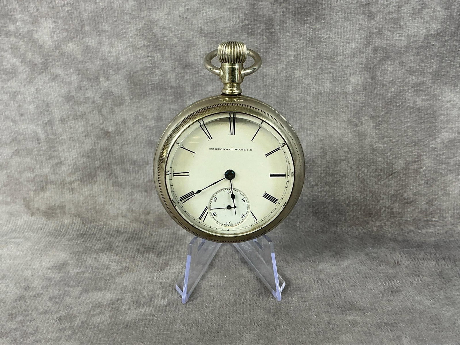 Elgin National Watch Co Pocket Watch: Circa 1890 Elgin National Watch Co, Elgin Illinois open face pocket watch. Roman numerals with second hand subdial. Screw off back plate marked Fahy's Ore Silver No. 1 pat. Feb 19th 1884, serial