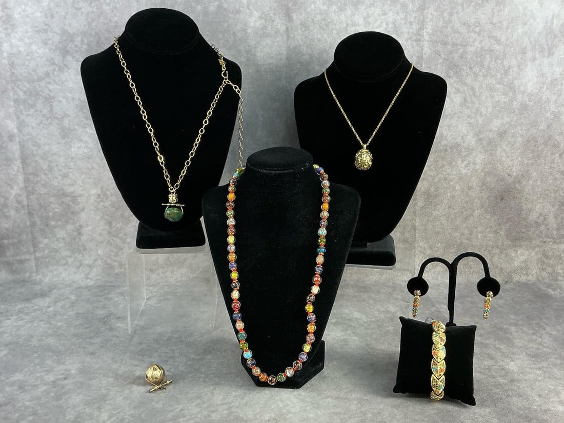 Costume Jewelry: Costume jewelry containing three necklaces, bracelet, earrings and additional pendent. Brands included D'Orlan, Stauer, and Sennod. All in good condition. Longest chain measures 16.5 inches closed.