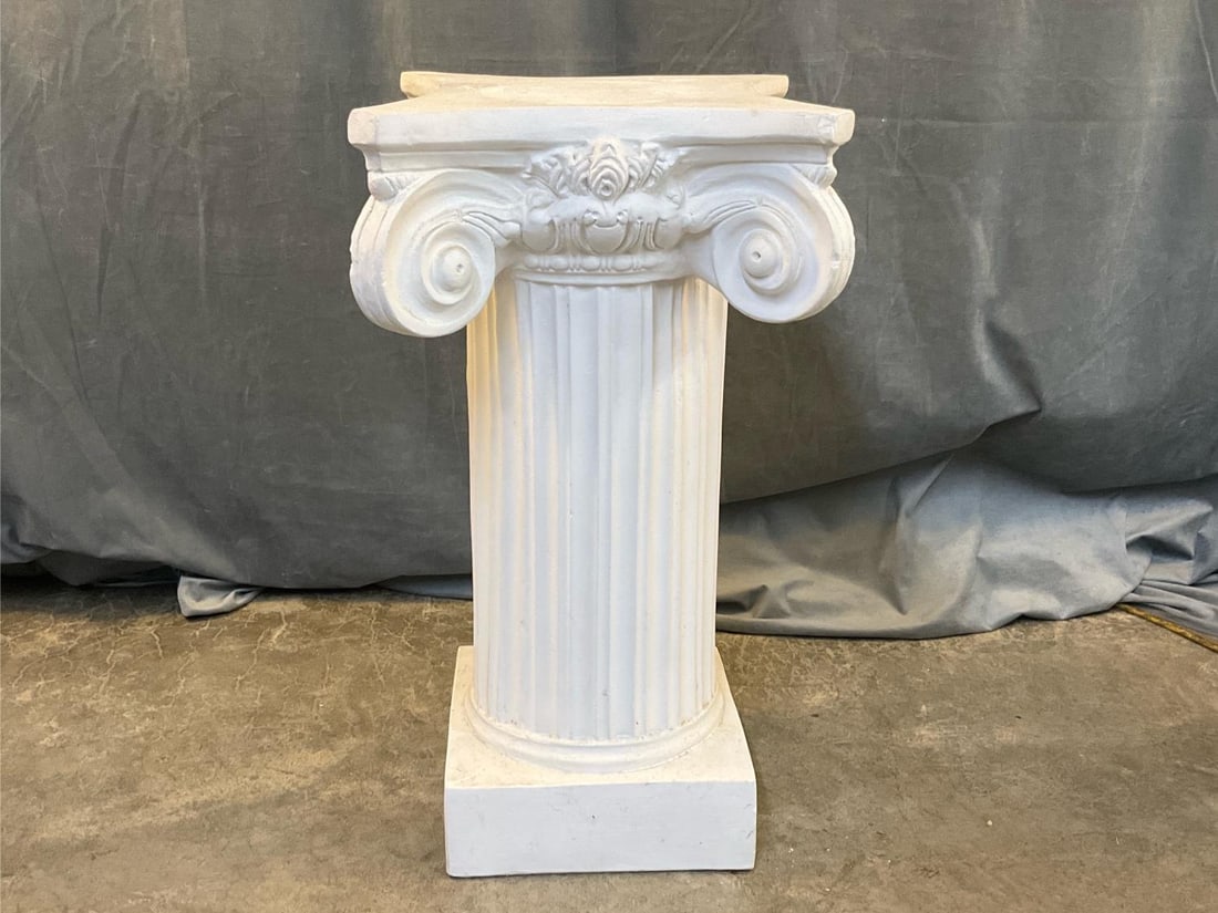 Plaster Pedestal: Contemporary neoclassical plaster pedestal. Several chips, otherwise good condition. Measures 15.5 inches wide x 15.5 x 28.75 inches tall.
