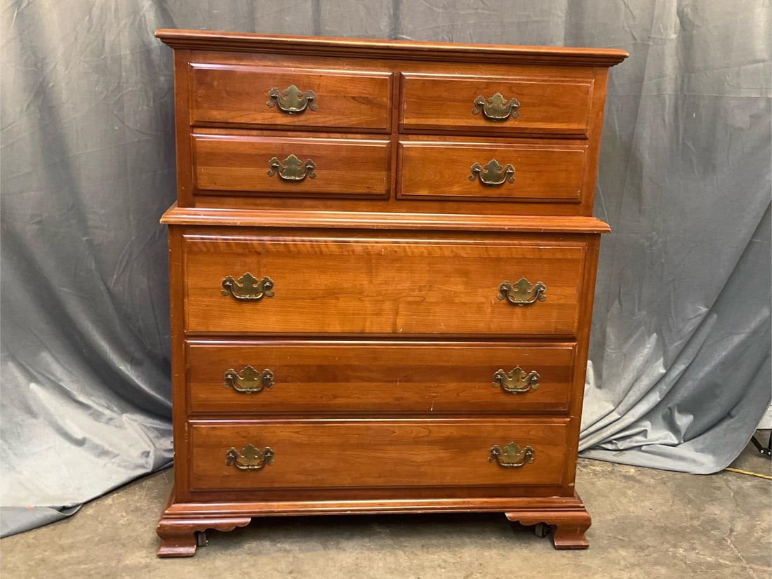 Chest on Chest: Mid-20th century Kling Furniture Company Chippendale style cherry chest on chest of seven drawers on castors. One drawer with a divided interior. Some wear to finish, otherwise good condition.