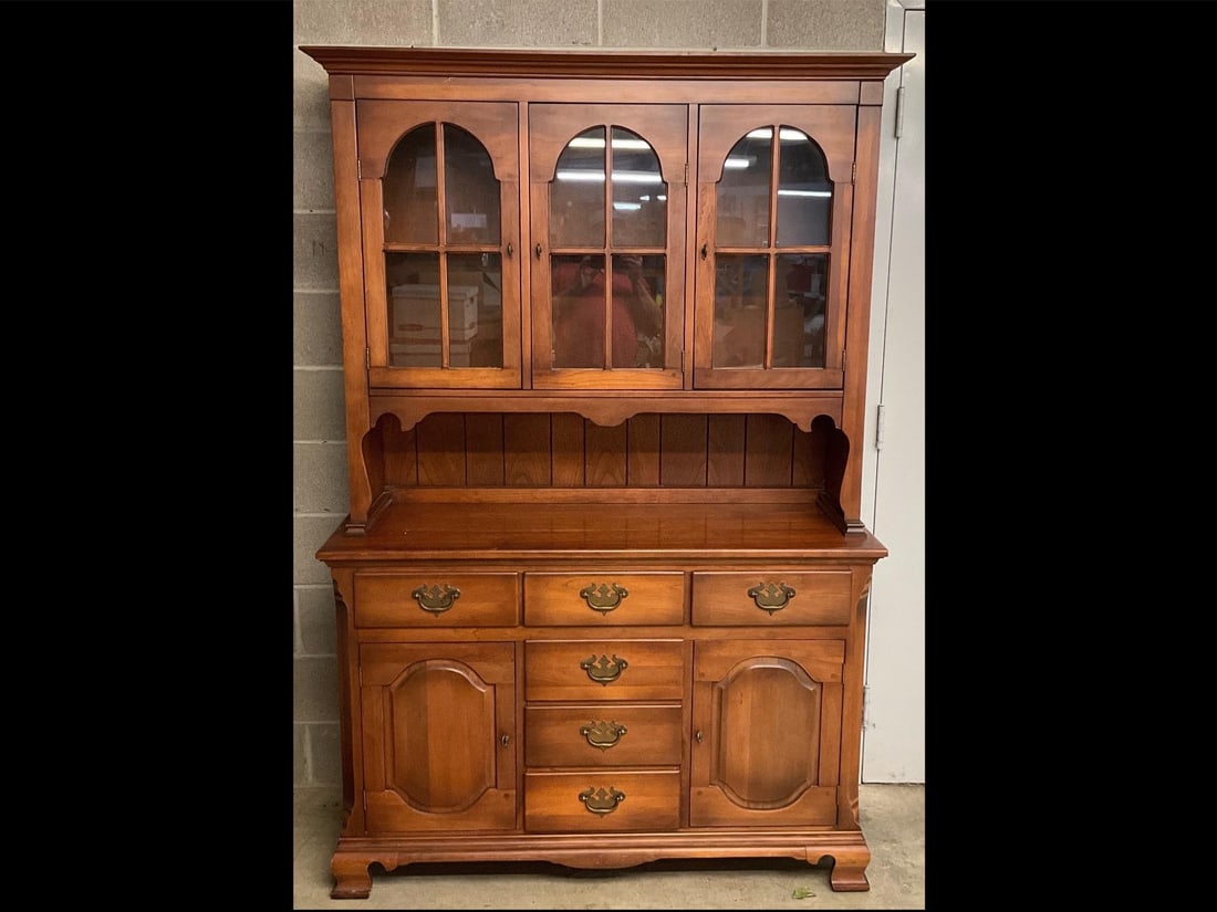 China Press/Hutch: Late 20th century Empire Furniture Company reproduction cherry two piece China press. Good condition. Measures 51.25 inches wide x 19.25 x 77 inches tall.