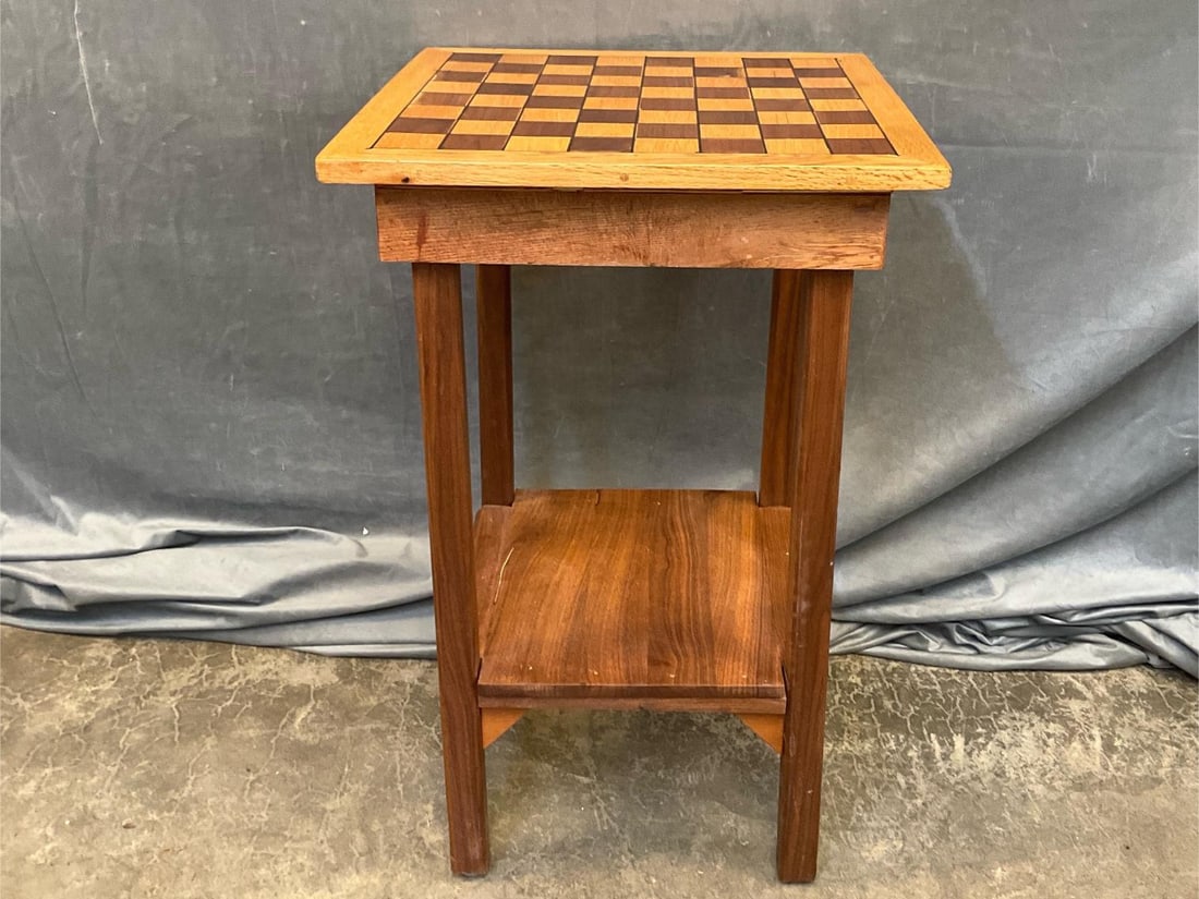 Game Board Table: Contemporary walnut and oak game checker/chess game table with lower shelf. Signed on bottom "6-20-2000 / X.E.E.S.S. / Willis VA". Good condition. Measures 19.5 inches wide x 19 x 30.5 inches tall.
