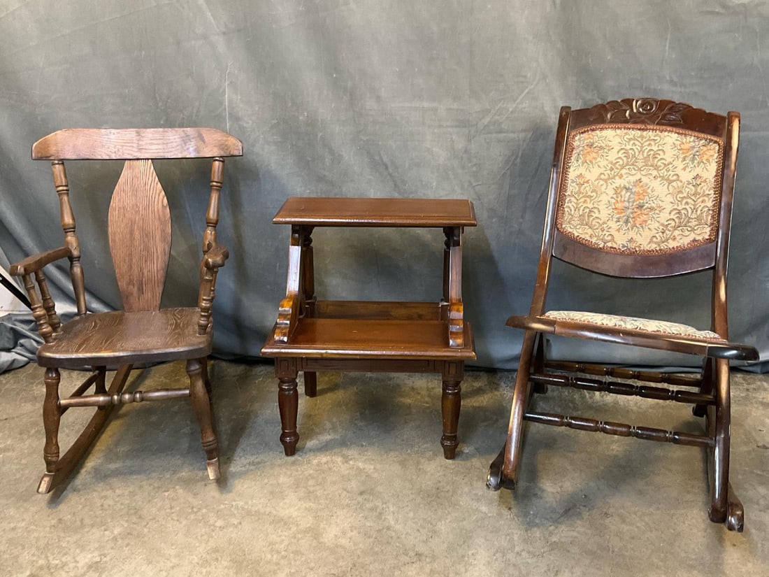Assorted Furniture: Mid-20th century folding upholstered rocking chair, mid-20th century oak child's rocking chair, late 20th century mahogany bed steps/library steps. Good condition. Steps measure 18 inches wide x