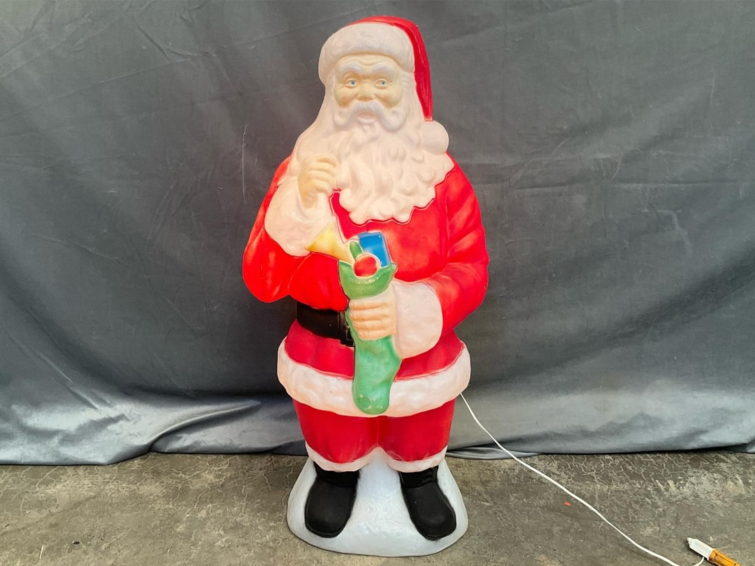 Santa Claus Blow Mold: 1970's vintage plastic lighted Santa Claus. Good condition, tested works. Measures 17 inches wide x 11 x 40 inches tall.