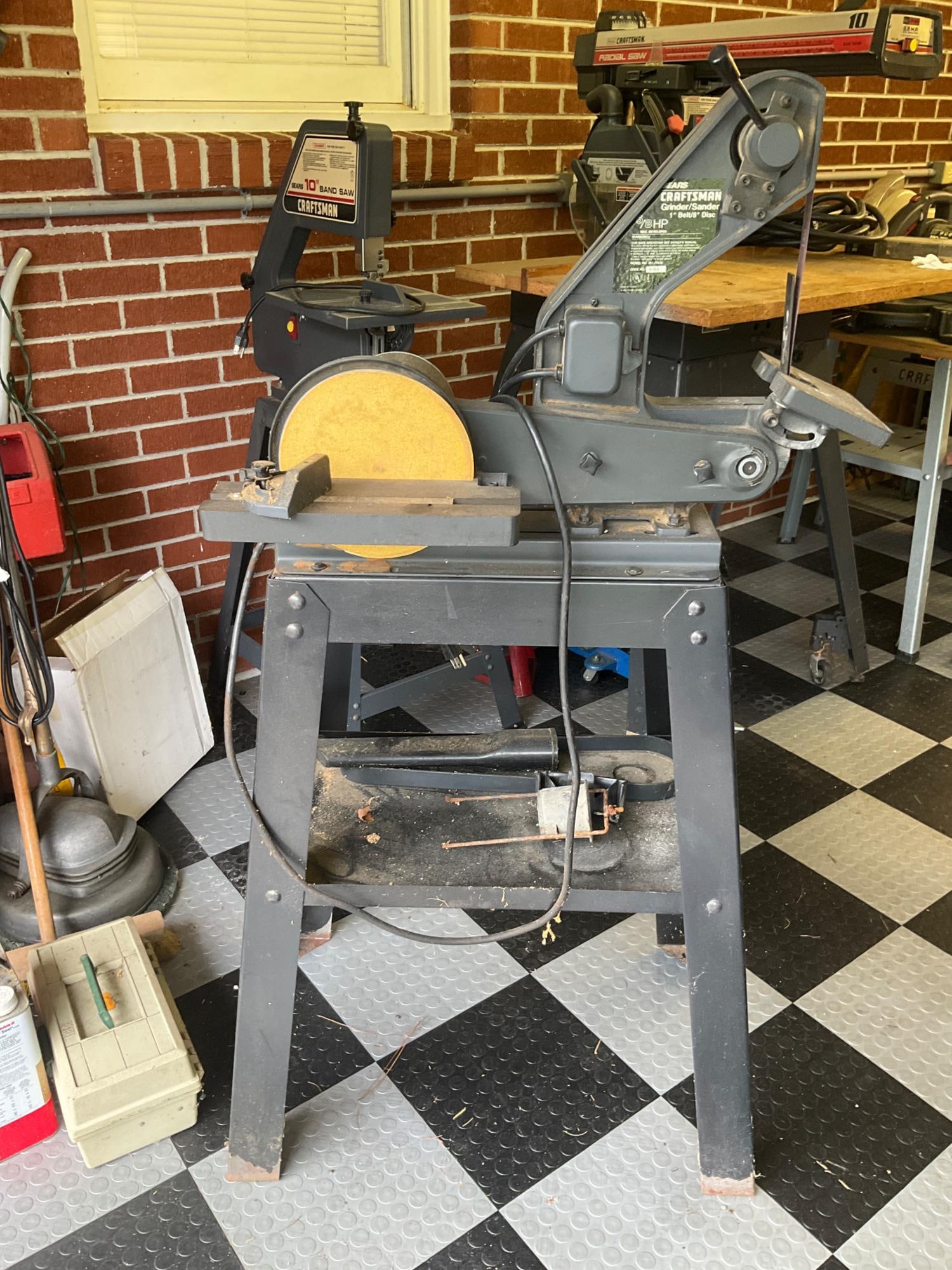 Craftsman Sander Grinder: Model 351-22632 5/8 hp, 1 inch belt and 8 inch disc, on stand. Used, in good condition. Measures 29 inches long X 15 inches wide X 53.5 inches high.