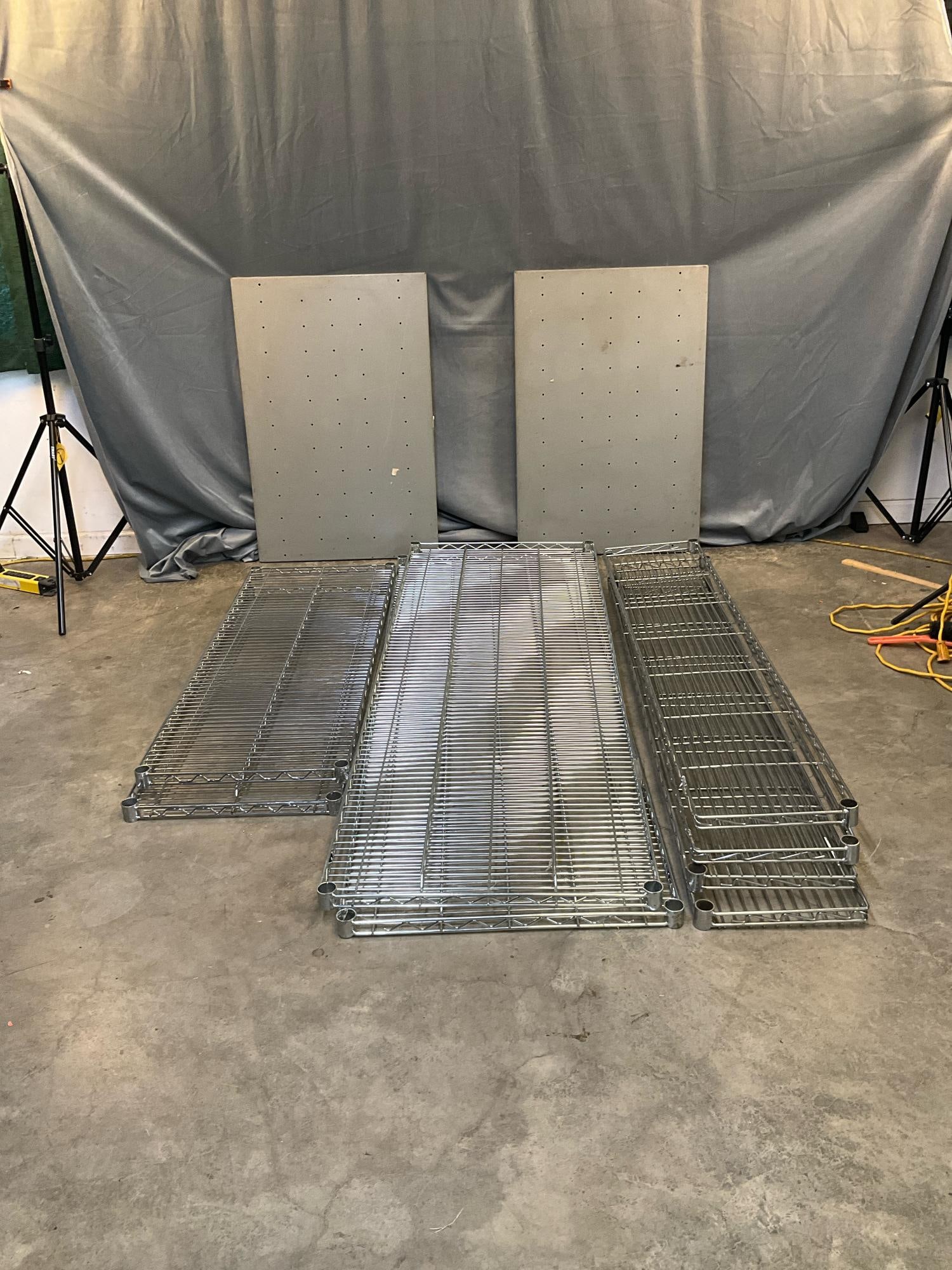 Metal Shelves: Eight grill/rack type stainless steel shelves without pole supports and plastic sleeves and two solid metal shelves without supports. Used good condition. Largest grill shelves measure 72 inches wide 
