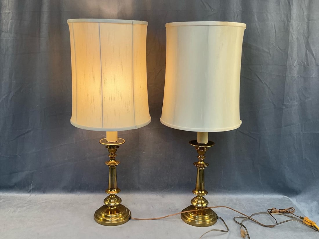 Brass Lamps: Late 20th century pair of brass lamps with shades. Tested and works, good used condition. With shades measures 13.5 inches in diameter x 36 inches tall.