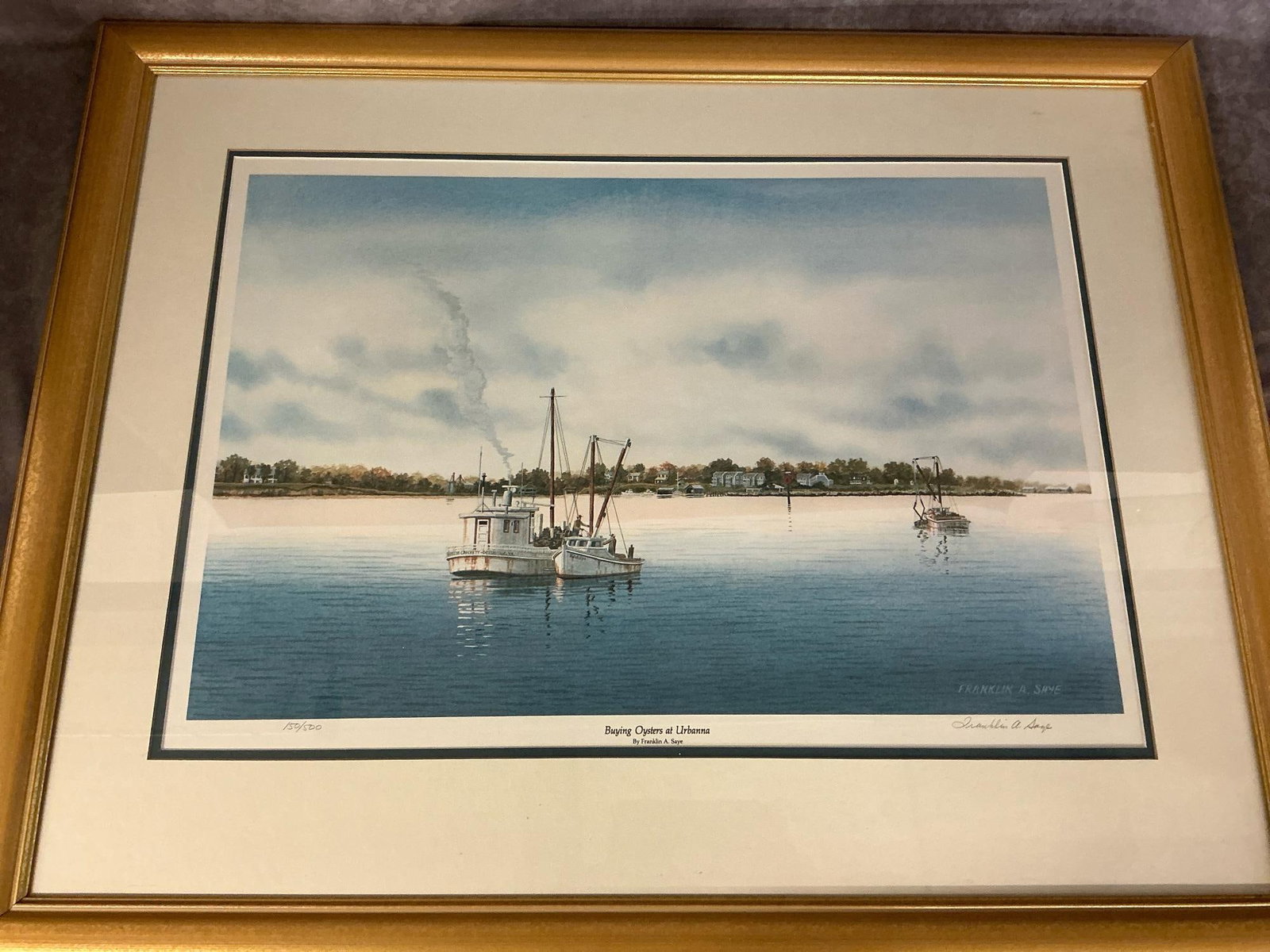 Buying Oysters at Urbanna: Limited edition signed print by Franklin A Saye. Titled "Buying Oysters at Urbanna" by Virginia artist, numbered 150/500. Matted and framed in gold tone wood. In good condition. Measures 35 inches