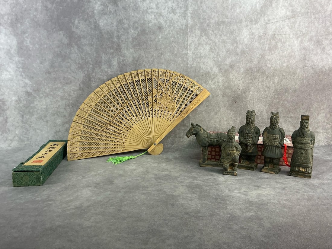 Chinese Treasures: Vintage set of Chinese Terracotta Army soldiers and horse, also Chinese sandalwood folding fan with lattice design. Both in good condition with minor chip to one soldiers headdress. Both comes with or