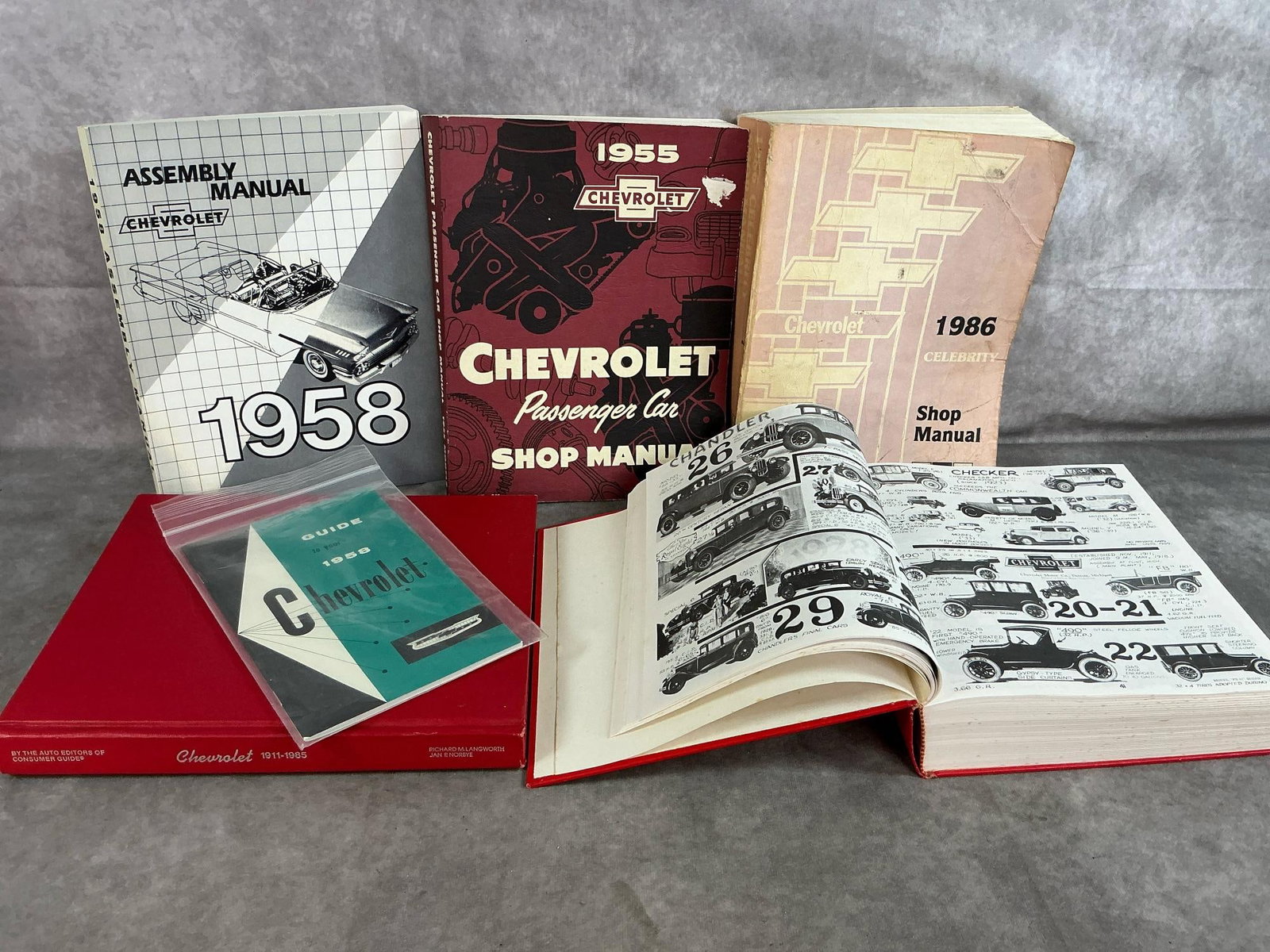 Chevrolet Manuals & Car Guides: Six 1950's to 1980's Chevrolet books. Includes Assembly Manual 1958, Shop Manuals 1955 and 1986, and paperback Guide for your 1958 Chevrolet. Also, Chevrolet 1911-1985, and Montrous American Car