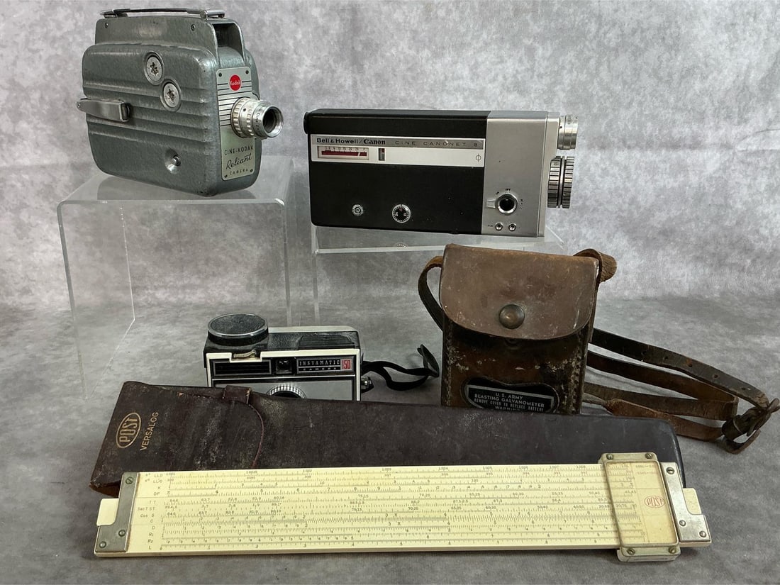 Movie Cameras, Slide Rule, & More: Five mid 1900's cameras and more. Cine-Kodak Reliant 8mm movie camera, Bell & Howell Canon Canonet 8 mm, and Kodak Instamatic 150 camera. Includes Post Versalog slide rule with case and US Army Blasti