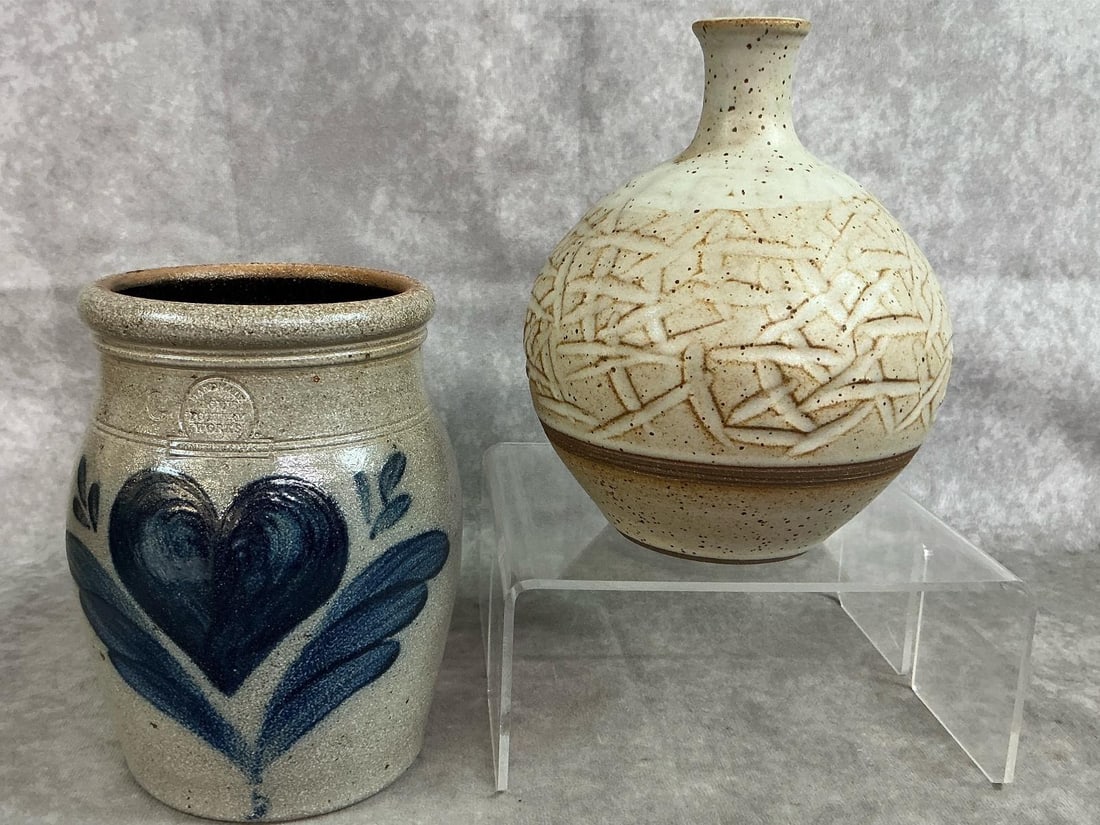 Rowe Pottery & NC Pottery: Two late 1900's handmade pottery pieces. Tom Gray-Seagrove NC Art pottery with tan textured finish. Blue cobalt Rowe Pottery salt glazed jar with hand painted heart motif. Both in good condition.