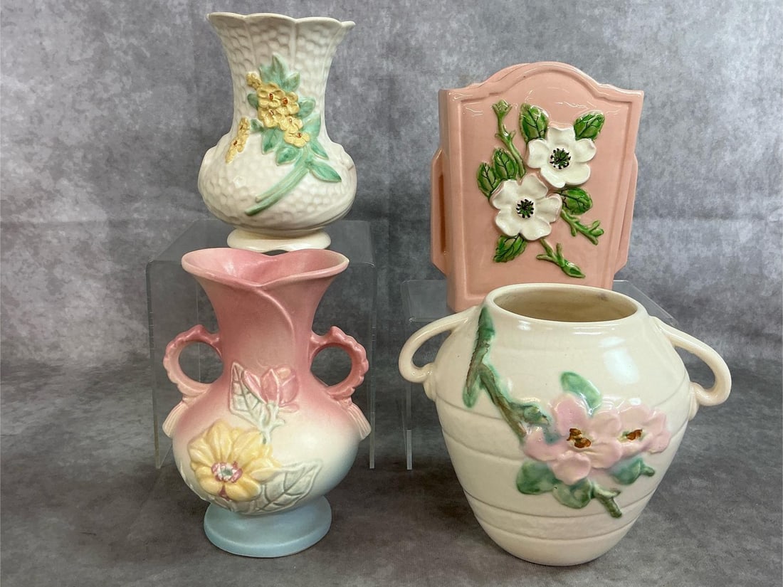 Hull & Weller Pottery: Four early 1900's pottery pieces. Hull Art Pottery pink vase with "Rosella" pattern and double handled blue, pink, and yellow "Magnolia " pattern vase. Includes ivory vase with dogwood blooms and ivor