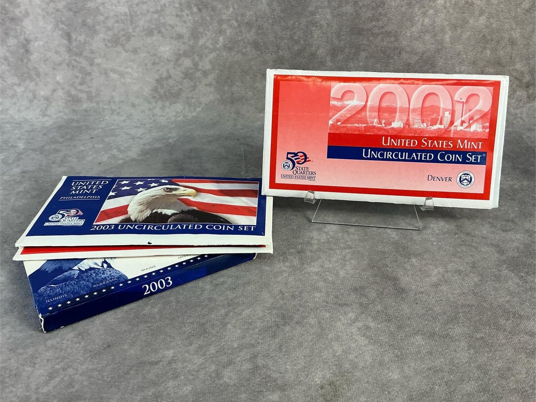 Proof Sets: Five United States proof sets dated 2002 and 2003, from Denver and Philadelphia mint. All in good condition. Largest measures 5.5 inches wide x 3.5 inches tall.