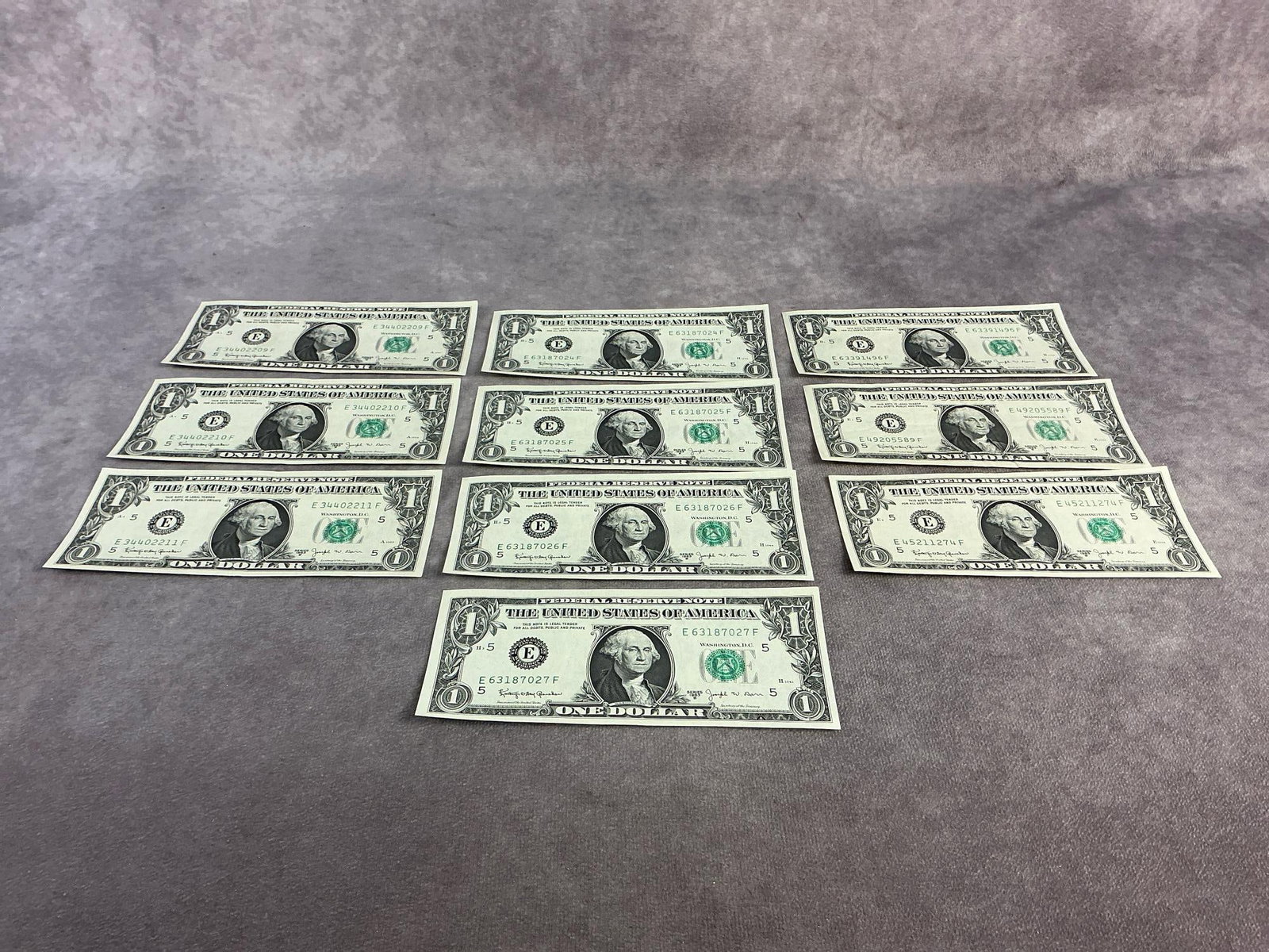 Sequential Bills: Two sets of sequential one dollar bills with three additional bills. All in good circulated condition. Each measures 6 inches wide x 2.65 inches tall.