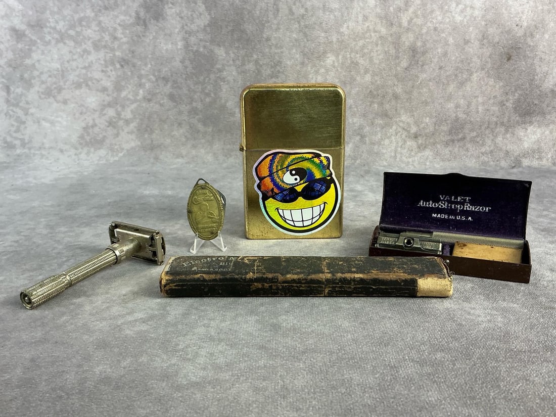 Razors & More: Electro magnetic straight razor, two 1960s adjustable razors, oversized zippo style lighter, and Coca Cola keychain knife. All in good condition. Lighter measures 2.75 inches wide x 4.5 inches tall.