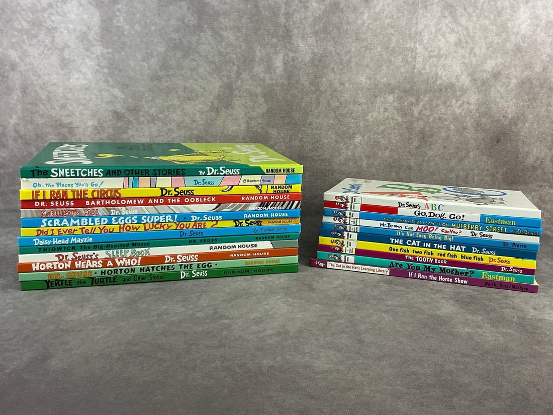 Dr Seuss Books: 1980s through 1990s prints of Dr Seuss books including ABC, Go Dog Go, The Cat in the Hat, and more. All in good condition with a total of twenty three books. Larger books measure 8.25 inches wide x