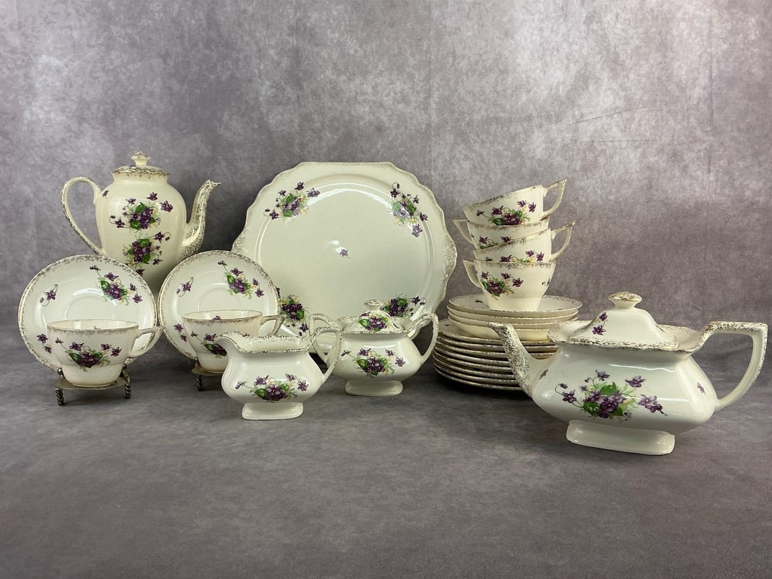 Hampton Tea Service Set: 1940s to 1950s Hampton China tea service set with purple violet floral layout and 22kt gold trim. Setting of six with two additional appetizer plates. All in good condition with crazing throughout. Se