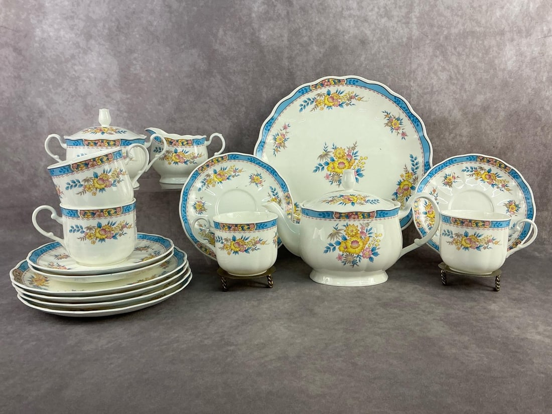 Mikasa Tea Set: Hospitality by Mikasa tea set. Bone china made in Narumi, Japan. Set for four and all in good condition. Server measures 10.5 inches in diameter.