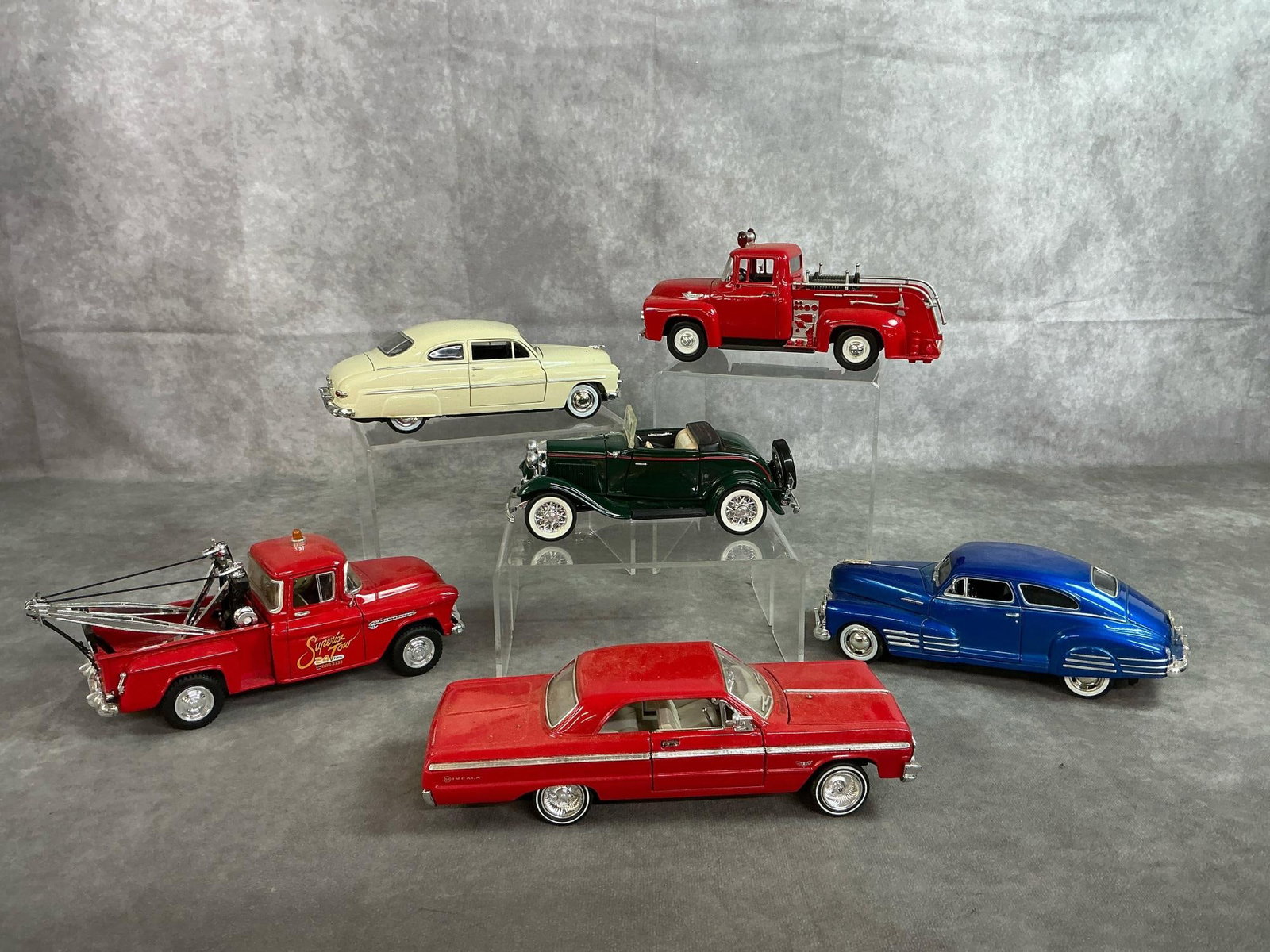 Diecast Collectors Model Cars: Six antique classic car replicas. 1949 Mercury Coupes scale 1:24. 1932 Sunnyside Ford V8 Cabriolet SS scale 1:24. 1955 Sunnyside Chevrolet Cameo Stepside Wrecker Tow Truck scale 1:24. 1956 Smart Toys 