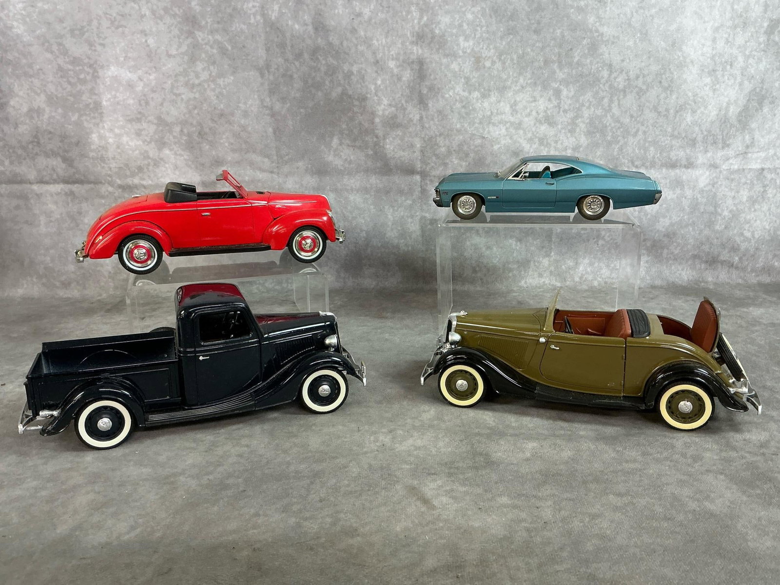 Diecast Collectors Model Cars: Four antique classic cars replicas. 1967 Jada Chevrolet Impala 1:24 scale. 1934 Solido Ford V8 Roadster 1:19 scale. 1936 Solido Ford V8 pickup truck 1:19 scale. 1940 Golden Wheels Ford Roadster Conver