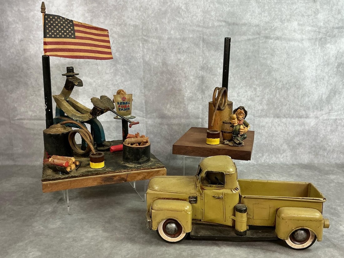 Collectible Tin Truck & Moonshine Humor: Two vintage moonshine making humor collectible items and one vintage tin truck replica. The pole is broken on the American flag on the "Rebel Fuel Tank " item and the figurine is no longer attached