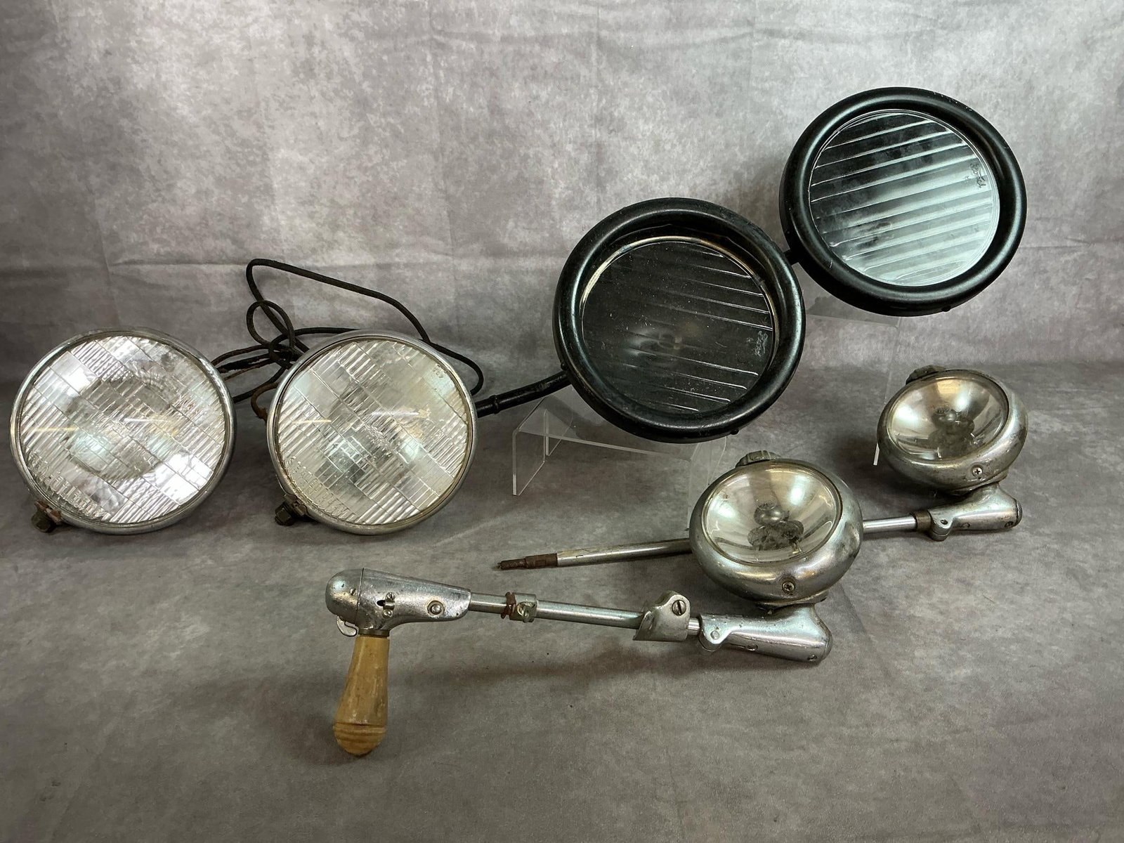 Antique Car Headlights: Six classic car headlights. Pair of original Ford Model T headlights with Ford imprinted on glass. headlights measure 9 inches long x 4.5 inches wide.