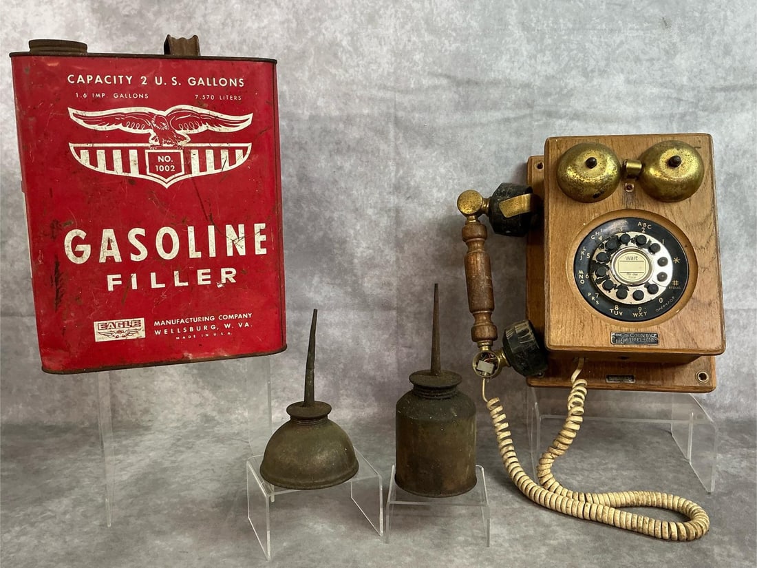 Replica Rotary Phone & More: Four vintage items. Wooden wall mounted Country Line push button phone. Eagle brand Gasoline Filler Can 2 gallons. Two long spout metal oil cans. Phone is missing the gold cap peice on bottom of recei