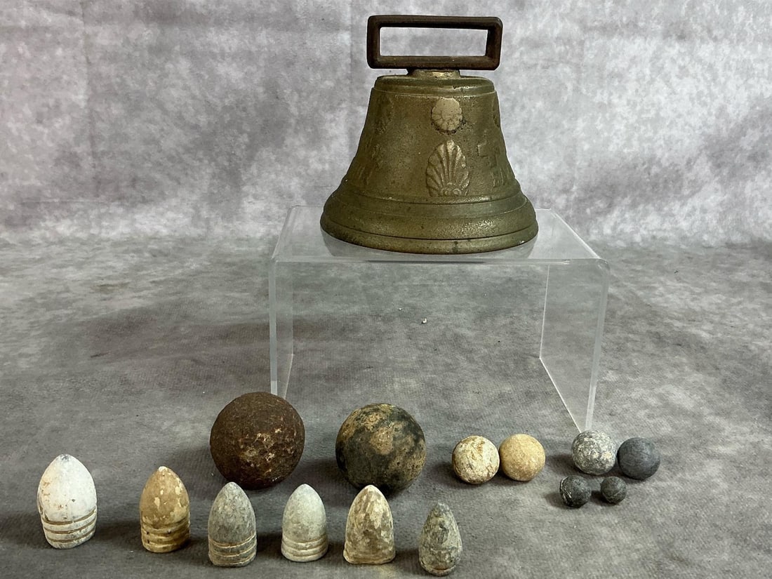 Swiss Cow Bell & Civil War Musket Balls: Fourteen musket and Minie balls and cow bell from mid to late 1800's. Brass swiss1878 cow or goat bell made by Chiantel Fondeur foundry. Includes eight musket balls in varied sizes and six cast lead