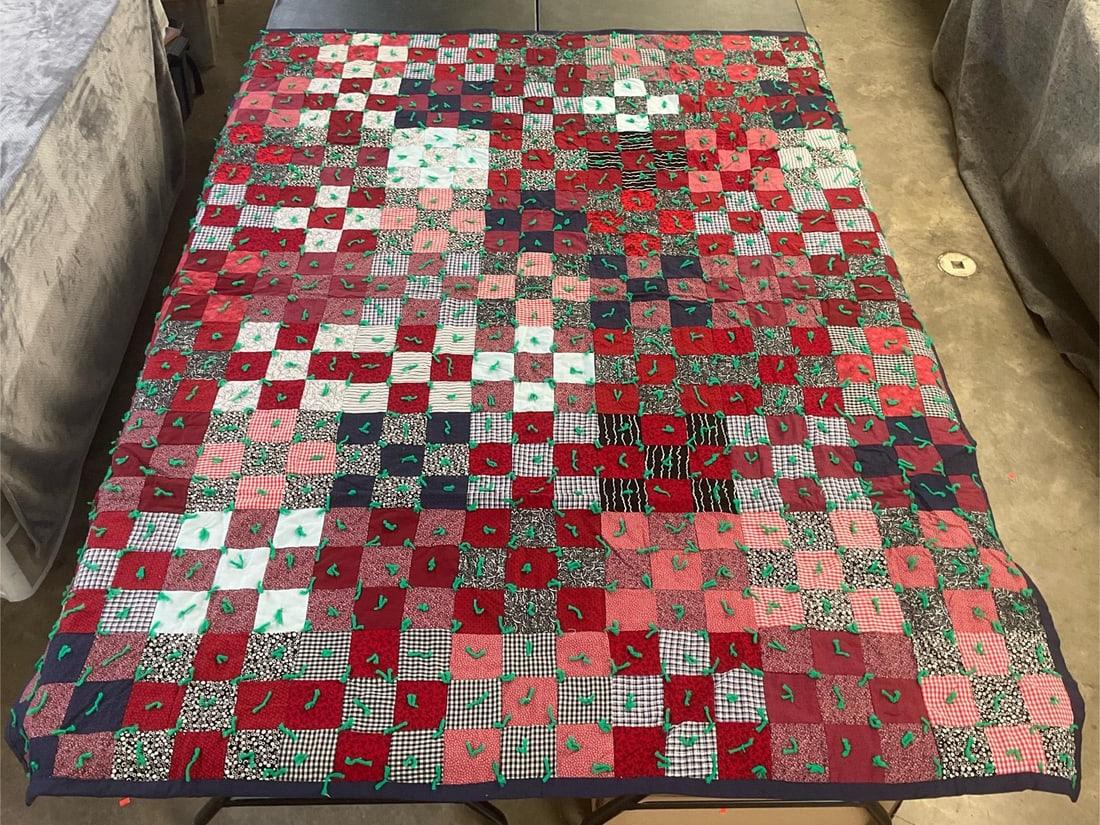Patchwork Quilt: Vintage homemade patchwork quilt, machine stitched and hand knotted. Good condition. Measures 67 inches wide x 85 inches long.