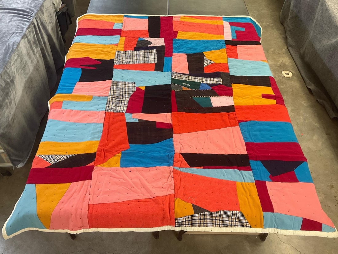 Crazy Quilt: Vintage homemade crazy quilt, machine stitched and hand quilted. Good condition other than a stain on the back. Measures 69 inches wide x 79 inches long.