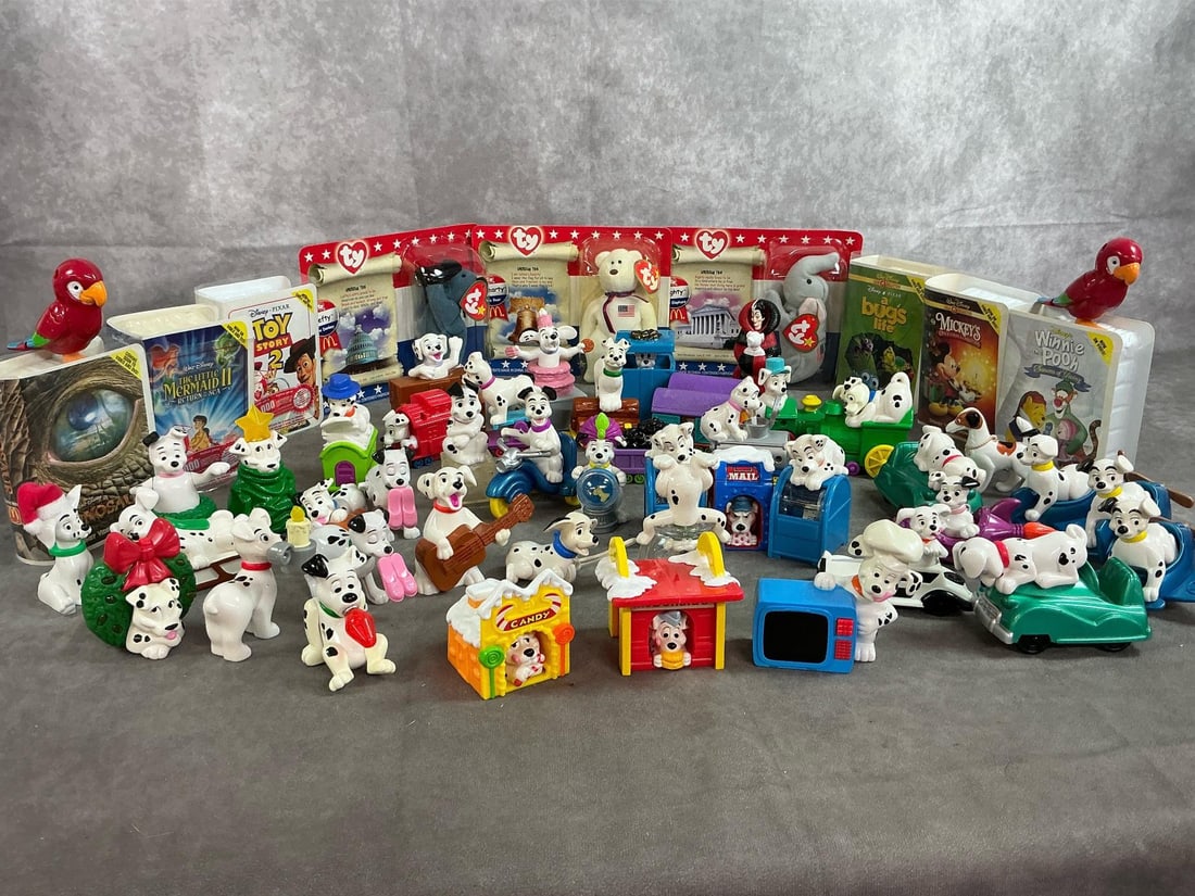 McDonald's Toy Dalmatians & More: Fifty-five 2000-2001 Happy Meal toys.includes forty-four 101 Dalmatians, six Disney Video figures in original packages and three Ty American Trio Bears. Some slight discoloration, otherwise in good co