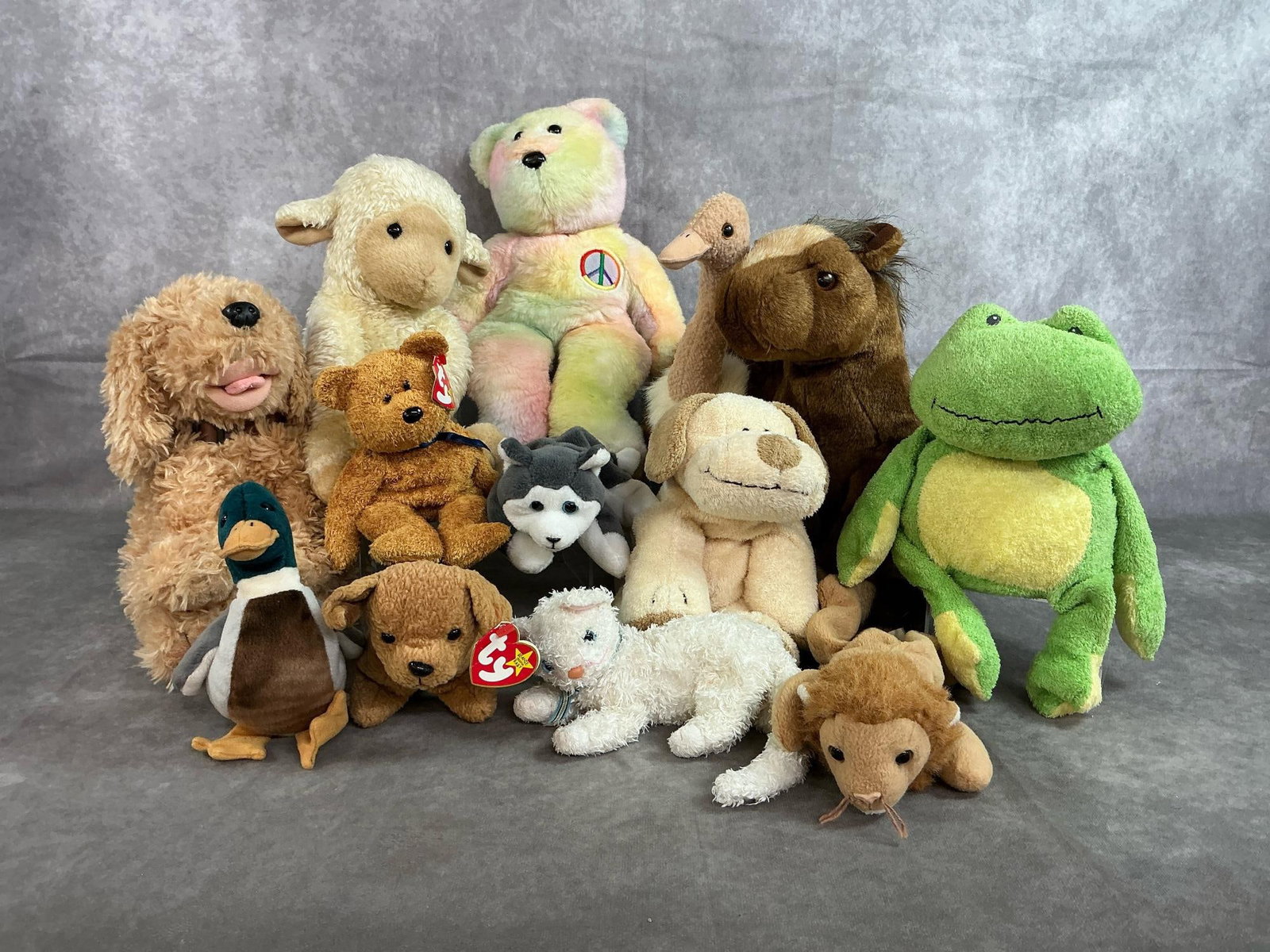 Beanie Babies Collectible Toys: Lot of TY Beanie Babies, Buddies collectors stuffed toys. All in good condition. Peace Beanie Babies Bear measures 9 inches length x 14 inches tall.