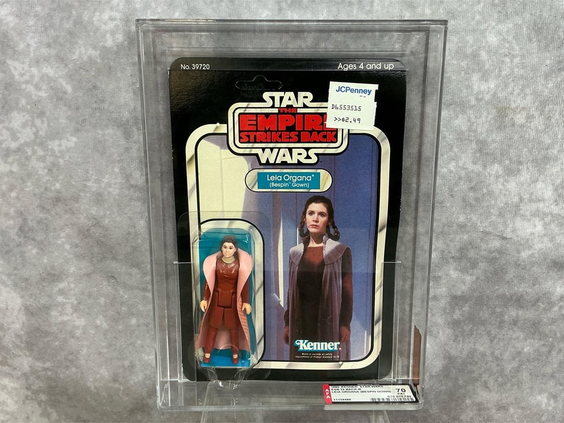 Leia Organa 70 EX+ ESB: 1980, 32 Back-B Star Wars Empire Strikes Back Leia Organa (Bespin Gown). AFA graded 70 EX+ with subgrades as follows: C75 B70 F80. Card is unpunched. Case measures 7.25 inches wide x 1.5 x 9.75